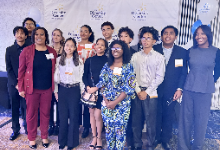 Group of students standing for a group photo. 